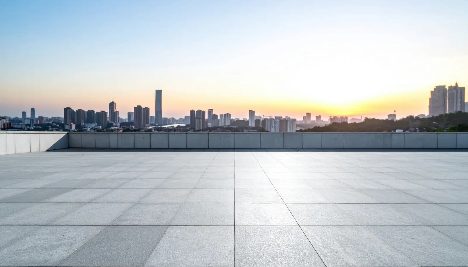 Flat commercial rooftop with a city skyline